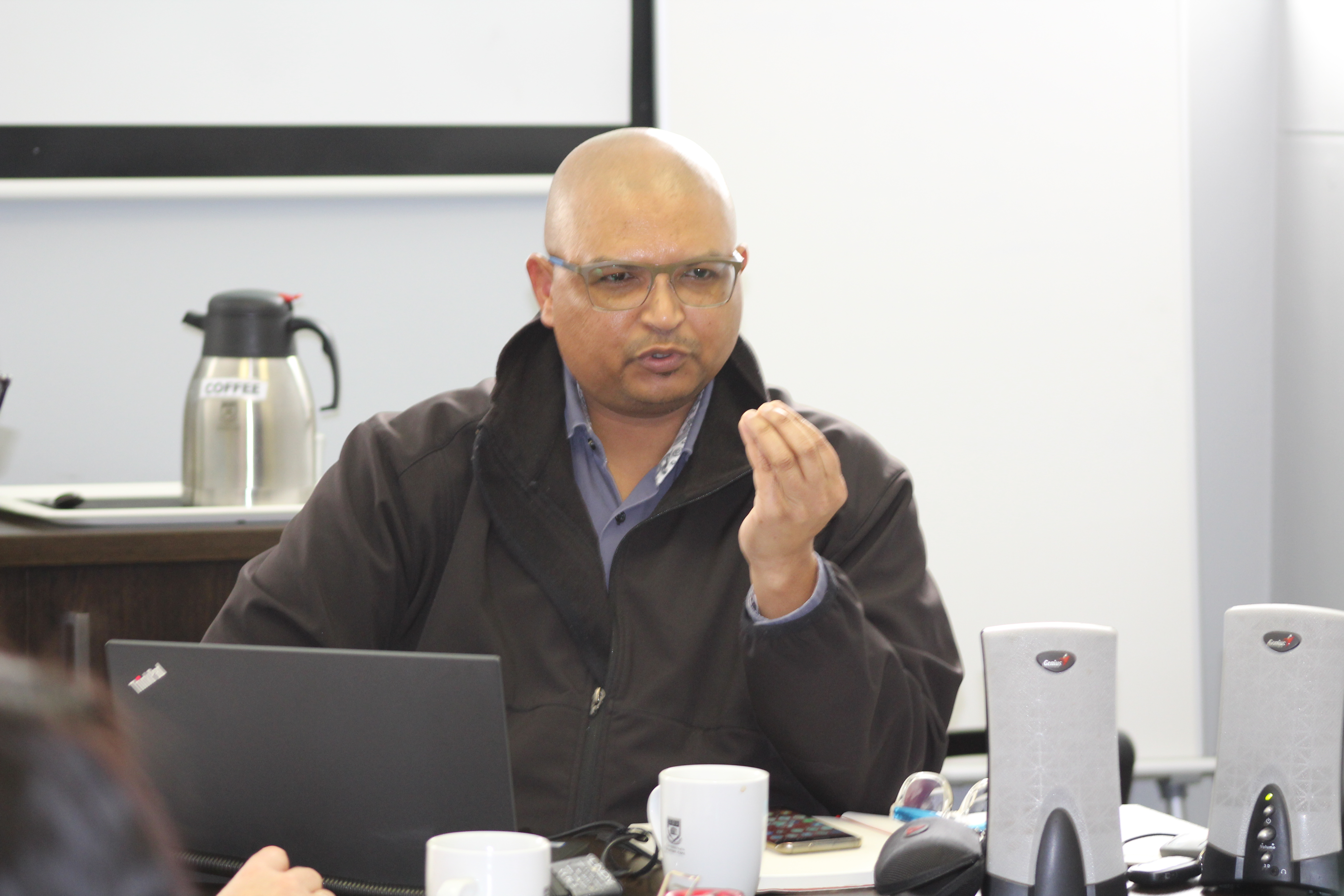 Dr Louis Scheepers giving a presentation about Integrated Development Planning