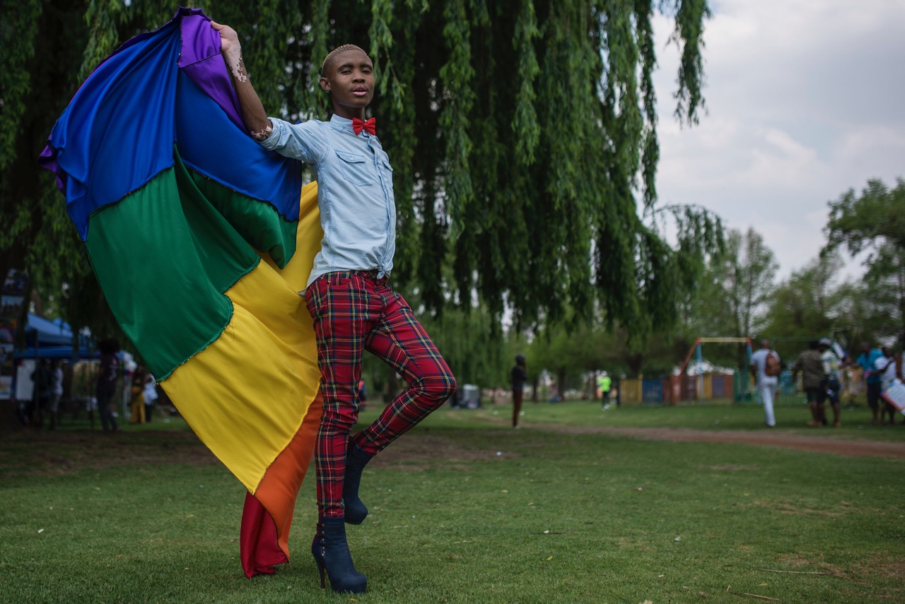 Photo Caption: Colourful displays at the Soweto gay pride in 2017 when the LGBTQ-community protested against hate-crimes and discrimination. Photo: Ihsaan Haffejee/GroundUp